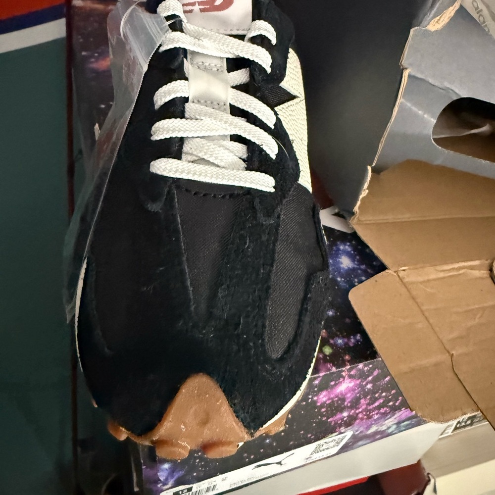 New Balance Black and White Athletic Shoes